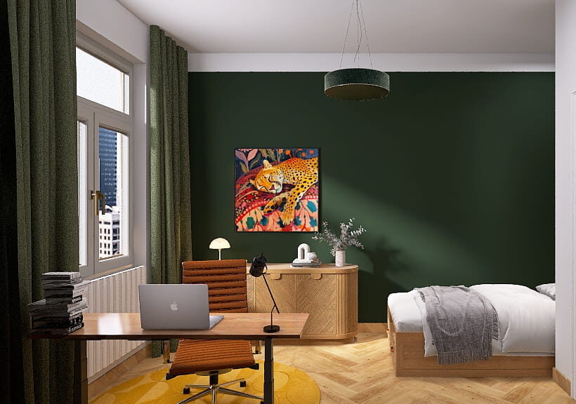 Modernes Altbau-Arbeitszimmer mit Gästebett, dunkelgrüner Wand und Holzmöbeln