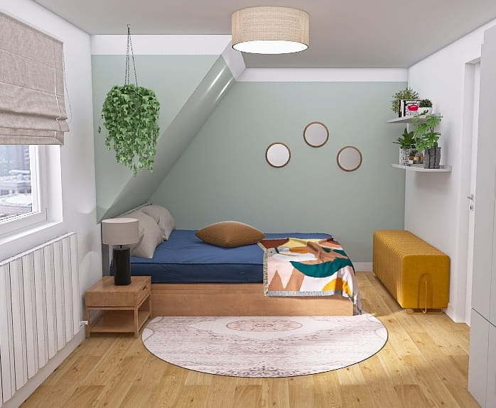 Kleines gemütliches Dachgeschoss-Schlafzimmer mit Schrägen in Mint und Holzbett